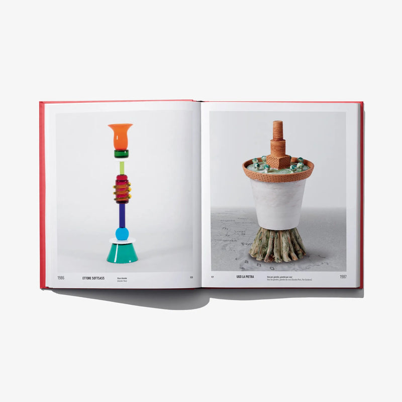 Open book spread with a colorful stacked vase and a white vase with a wood top