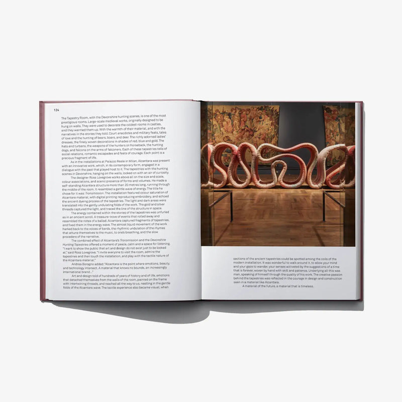 Open ALCANTARA art book with gallery photo of ornate sofa seating