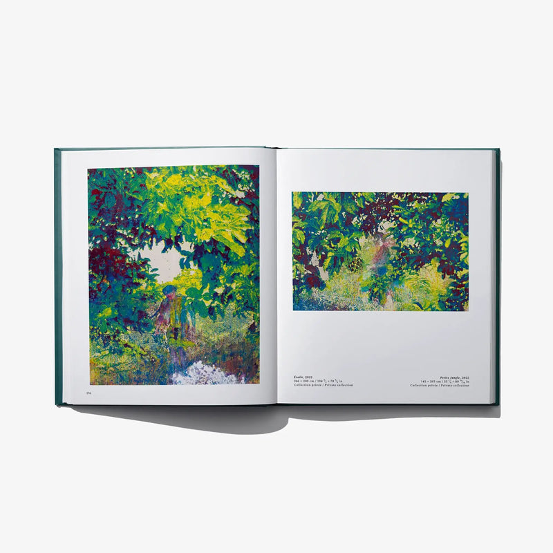 Open art book spread with two vibrant tree-filled landscape prints on pages
