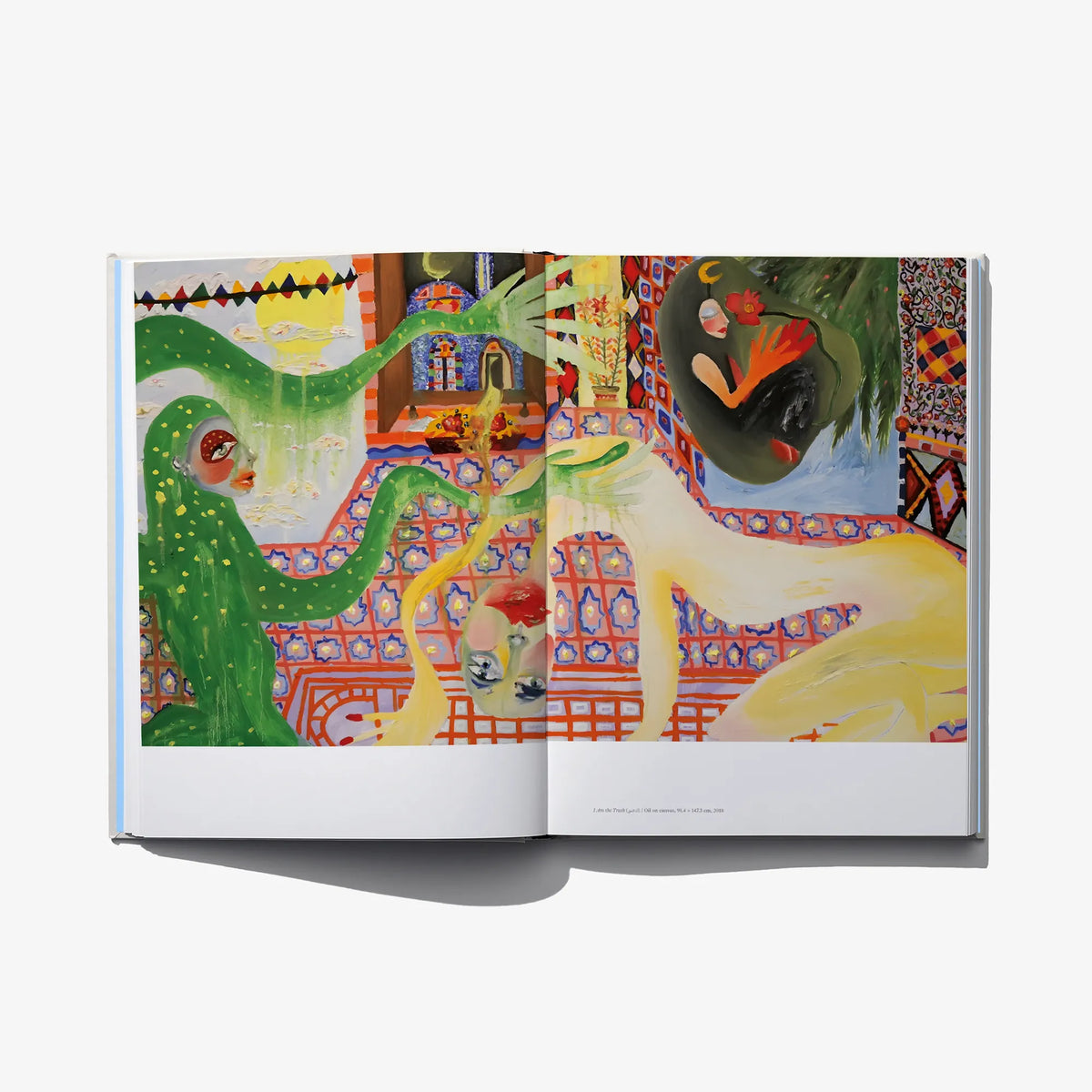 Open art book spread with colorful fantasy illustration and green figure