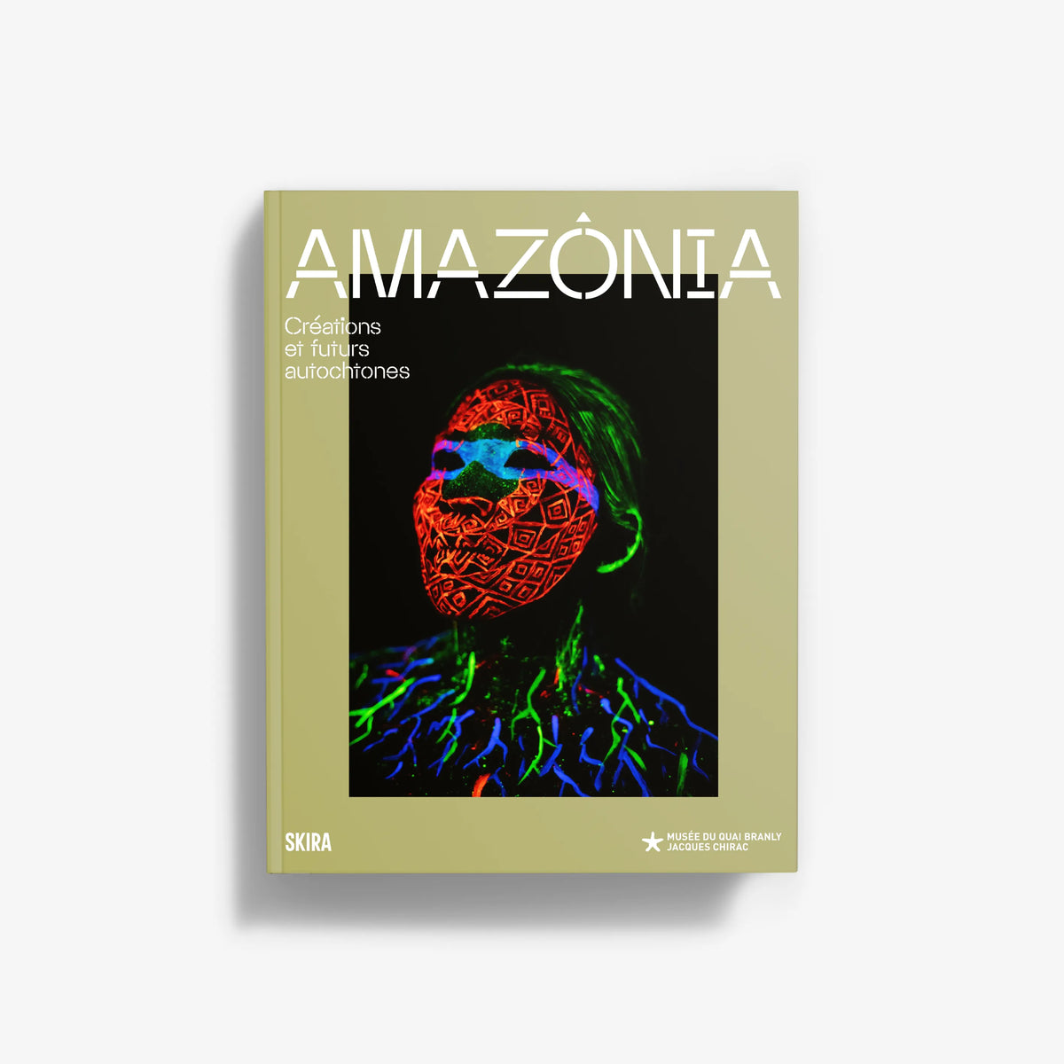 Amazonia book cover with colorful face illustration and indigenous-themed title