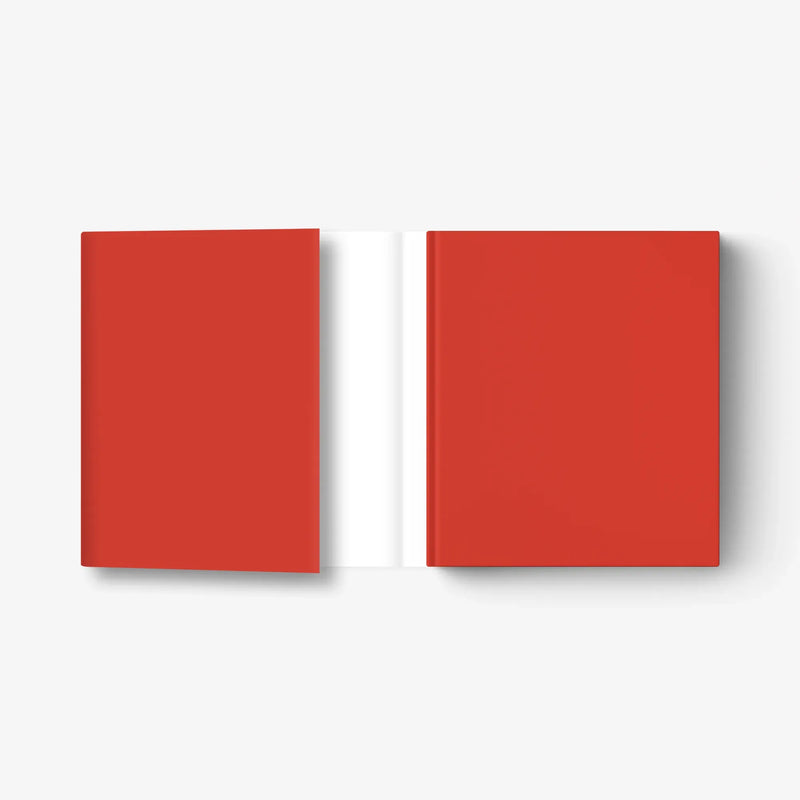 Hardcover book with red covers, spine in view, closed