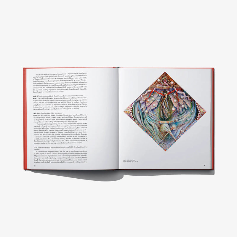 Hardcover book open spread with diamond-shaped decorative artwork on right page
