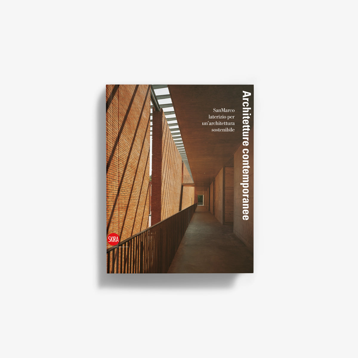 Contemporary architecture book cover with photo of modern building corridor and vertical title