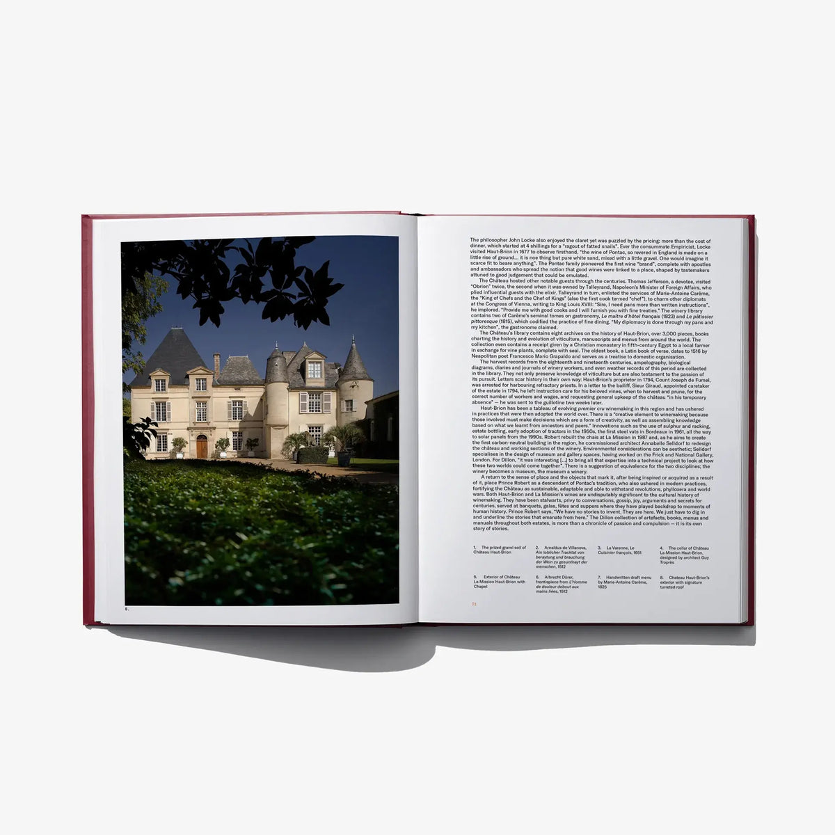 Open book spread featuring a vineyard chateau photo on left and text on right page.
