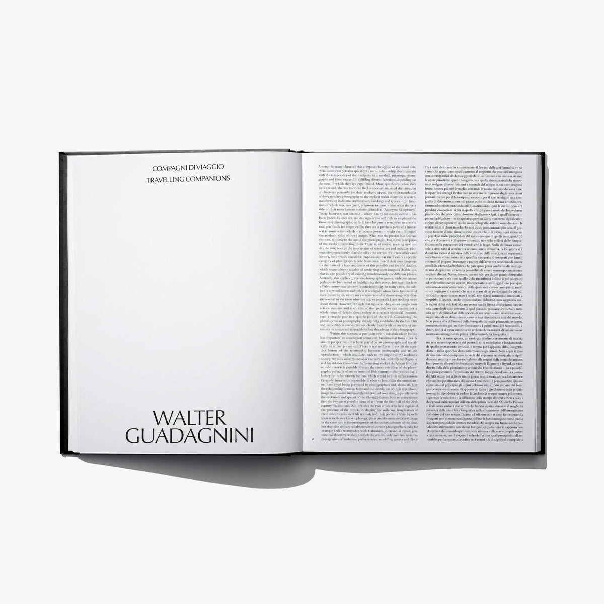 Open hardcover photo book with page heading 'Walter Guadagnini' and text