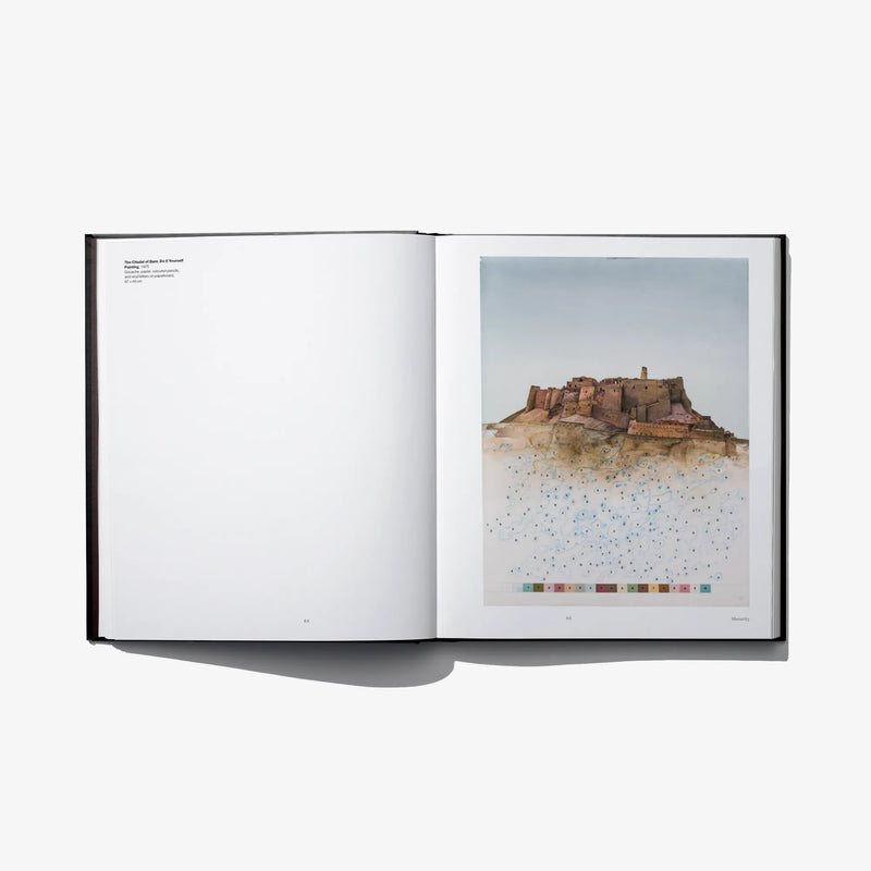 Open art book spread with blank left page and desert artwork with color blocks
