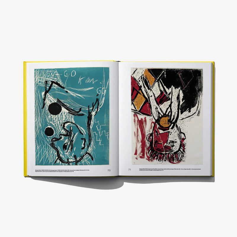 Opened art book showing two graphic prints in teal and red-black tones