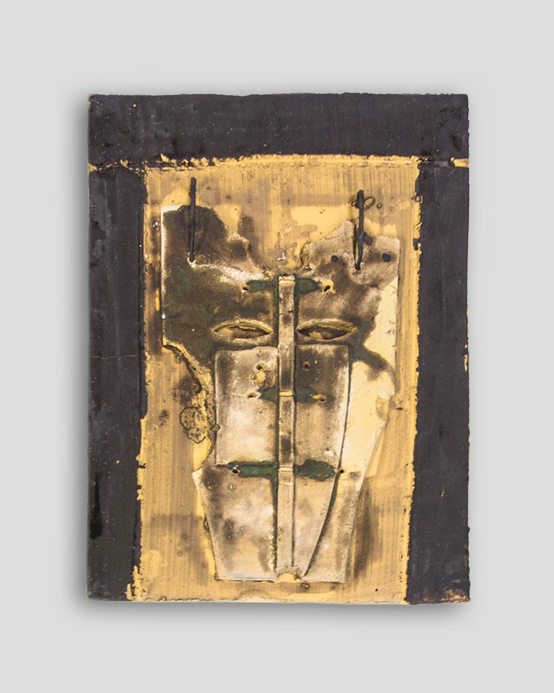Limited edition Mimmo Paladino sculpture by Skira Arte in painted terracotta with gold-toned face motif