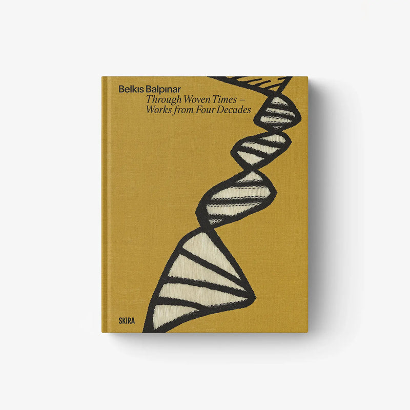 Hardcover art book with mustard cover and black abstract woven-line illustration