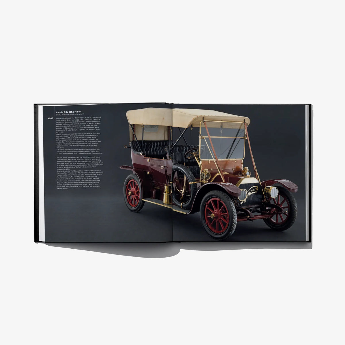 Open hardcover book spread featuring a maroon vintage car with tan top