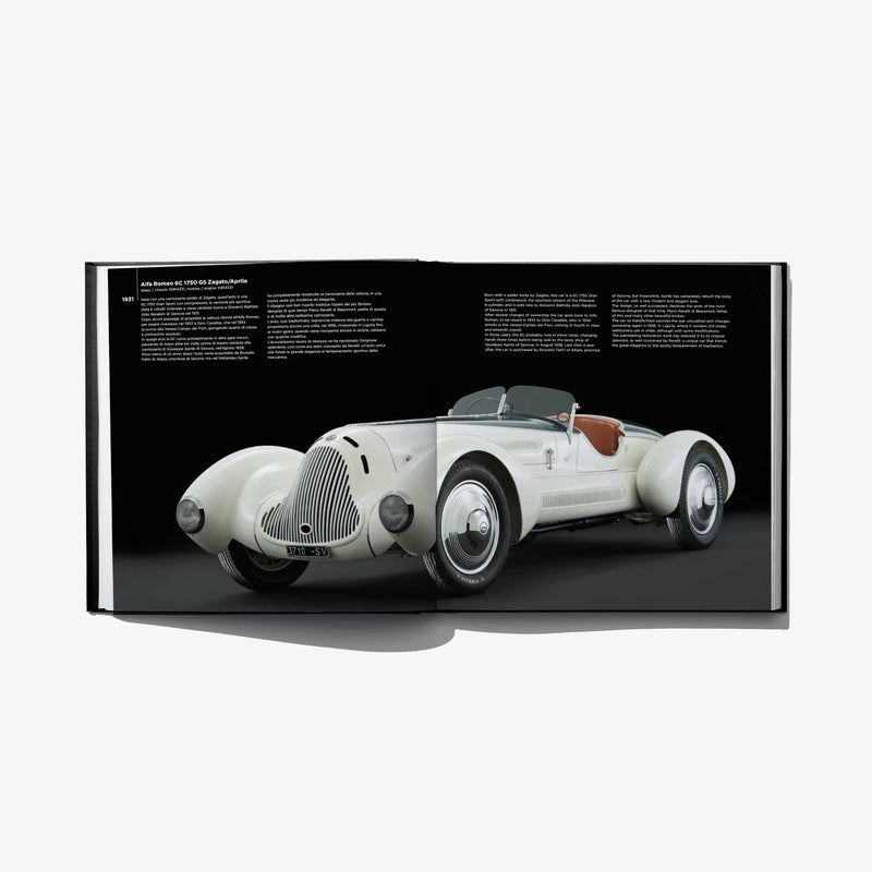 Open hardcover book spread featuring a white vintage convertible car