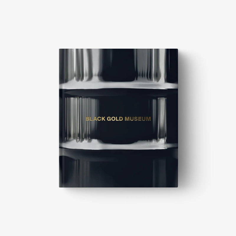 Hardcover art book cover with metallic blue-black finish and gold “BLACK GOLD MUSEUM” text