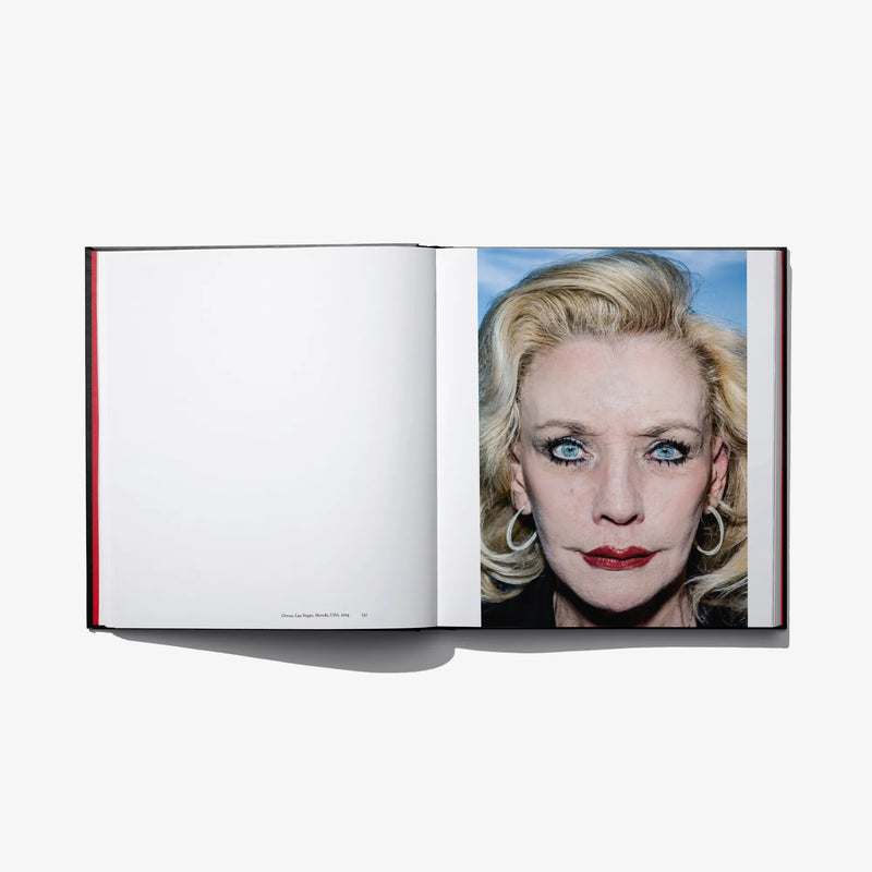 Open photo book spread with close-up portrait of a blonde woman