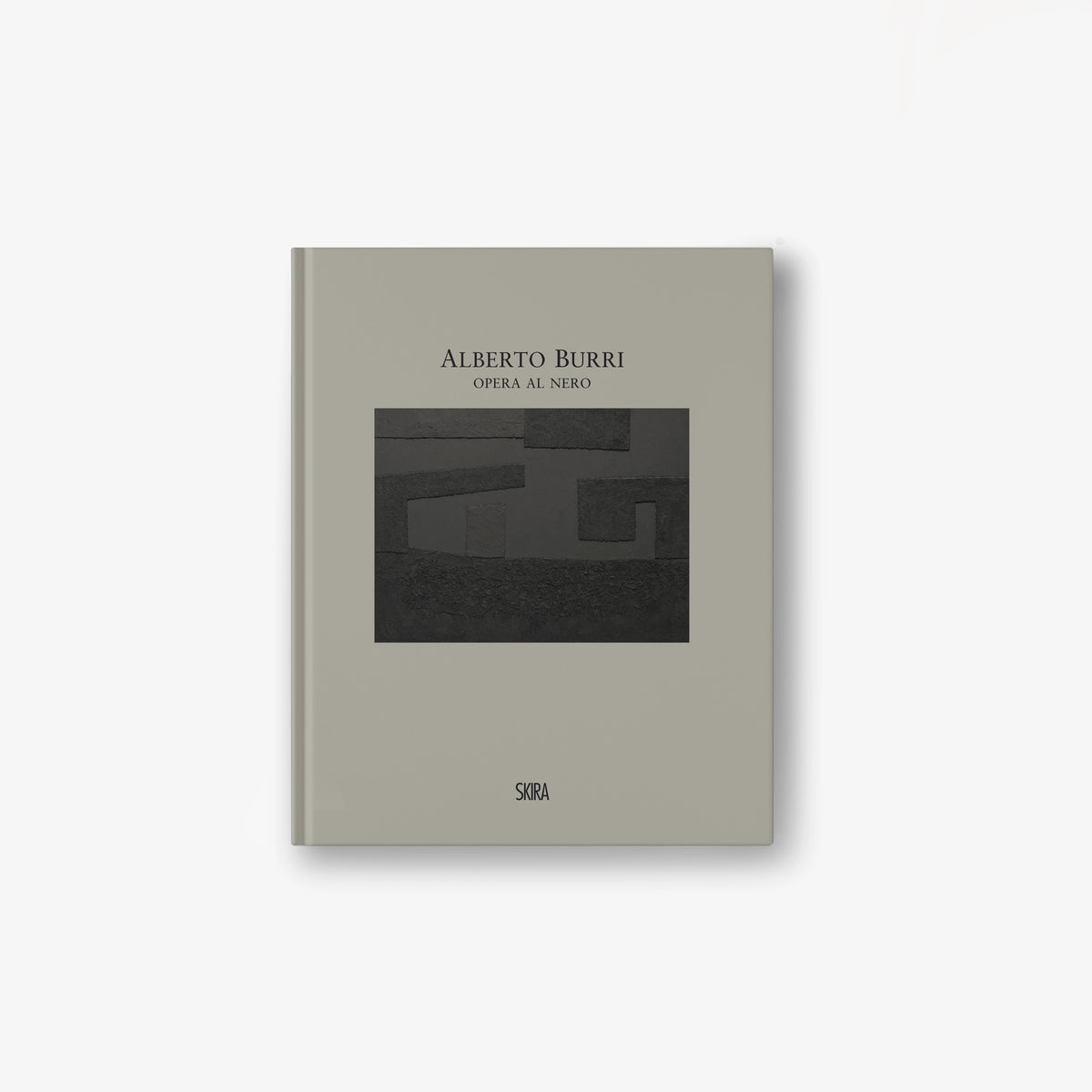 Hardcover art book, gray cover with black geometric design and text