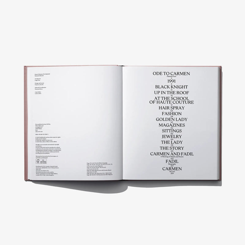 Open hardcover fashion book with typography list on right page