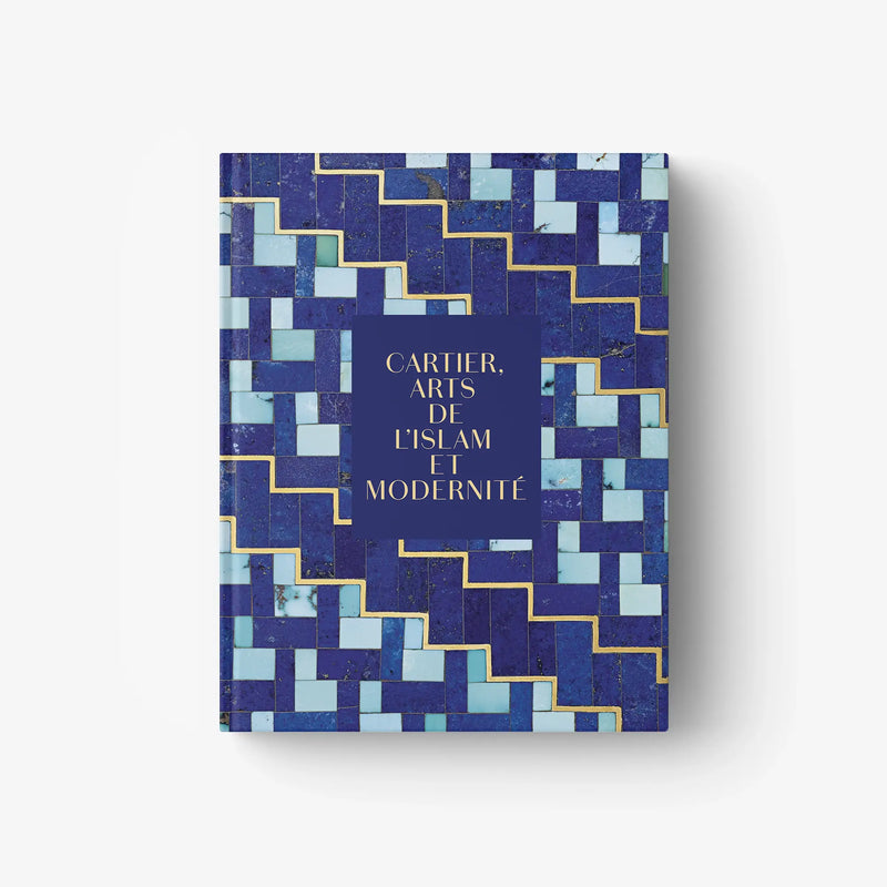 Cartier book cover with blue geometric pattern and gold-and-white title text