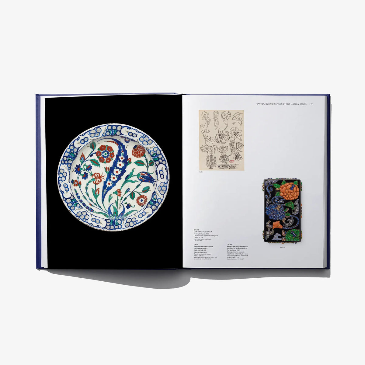 Open book showing a floral plate illustration, plus jewelry and design sketches