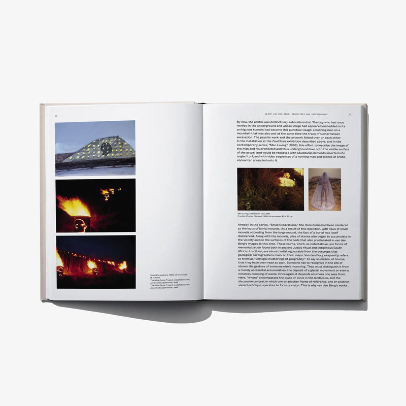 Open hardcover art book with three stacked photographic landscape images and text