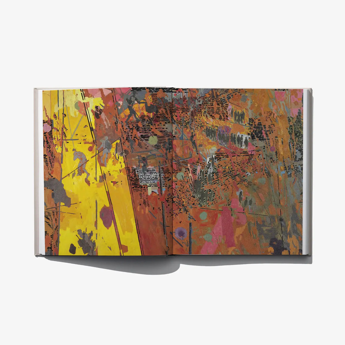 Open hardcover art book featuring a colorful abstract painting spread