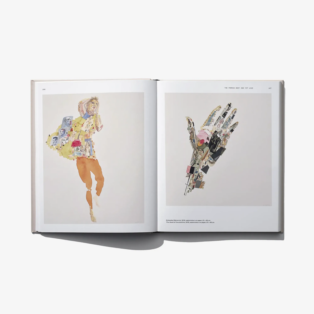 Open hardcover art book with two colorful full-body character illustrations
