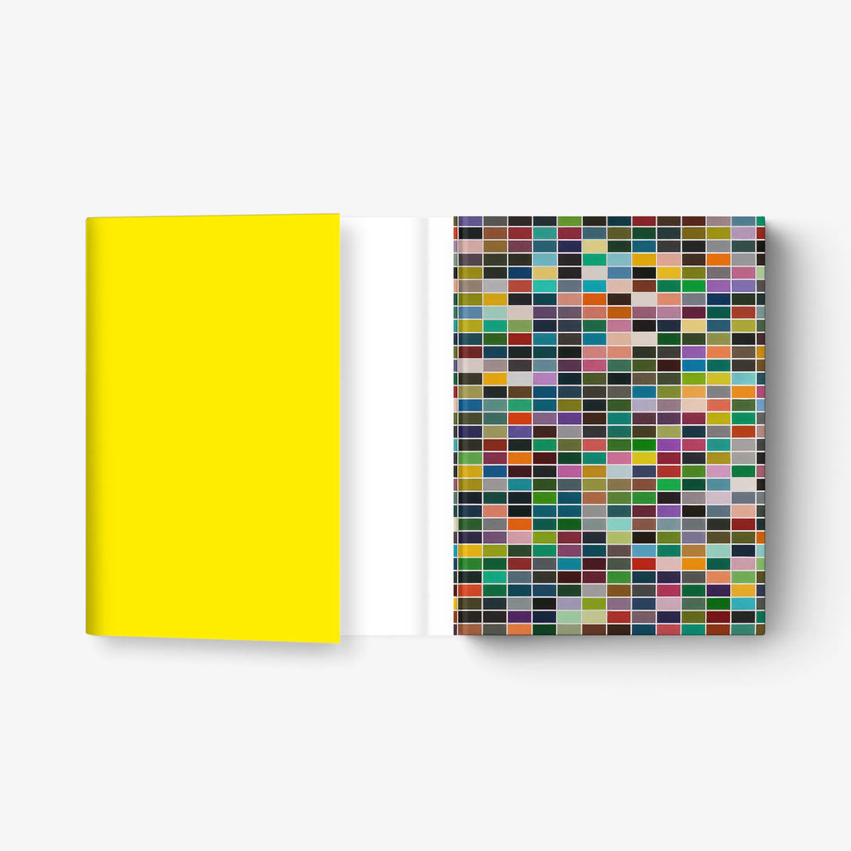 Set of art book covers: yellow plain cover and multicolor square-pattern cover