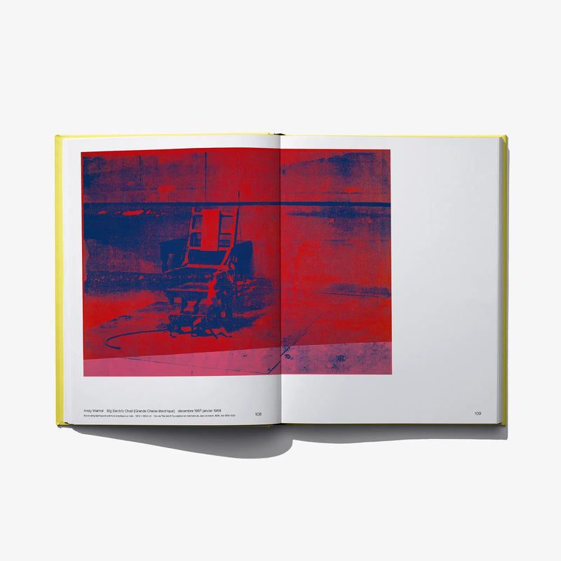 Open book spread with red abstract chair print across both pages