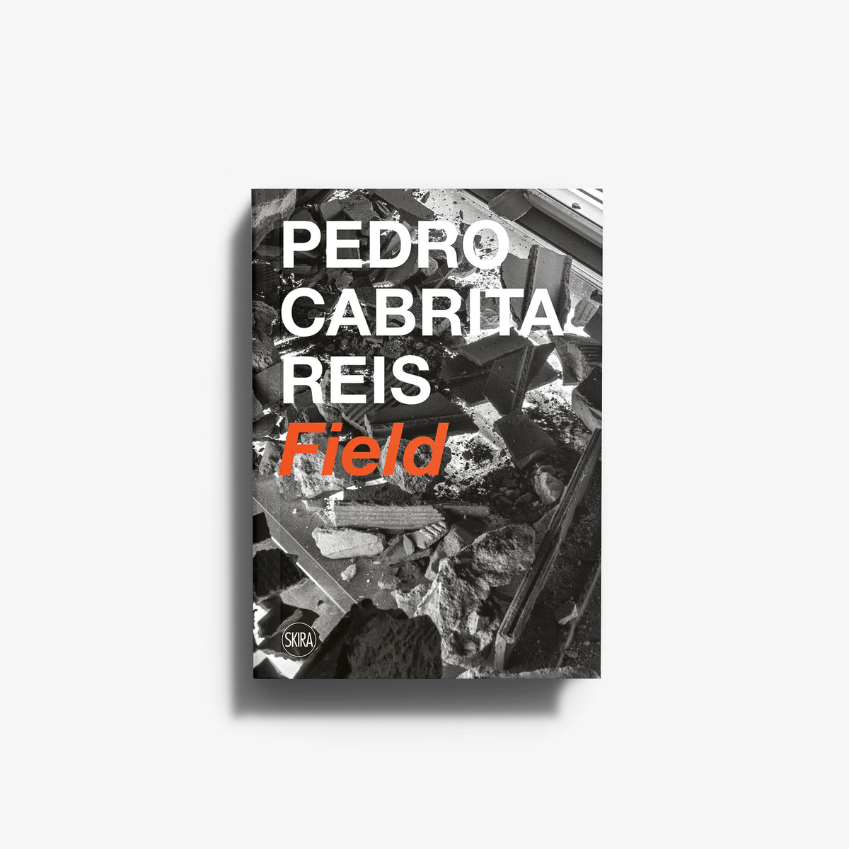 Art book in black and white with orange title text, Skira Arte, Pedro Cabrita Reis Field, documentation photograph