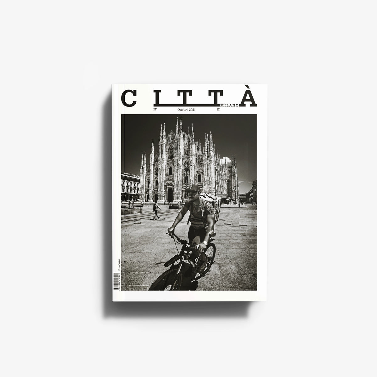 Photographic book by Skira Arte in black and white, hardback cover, featuring Milan cathedral and a cyclist