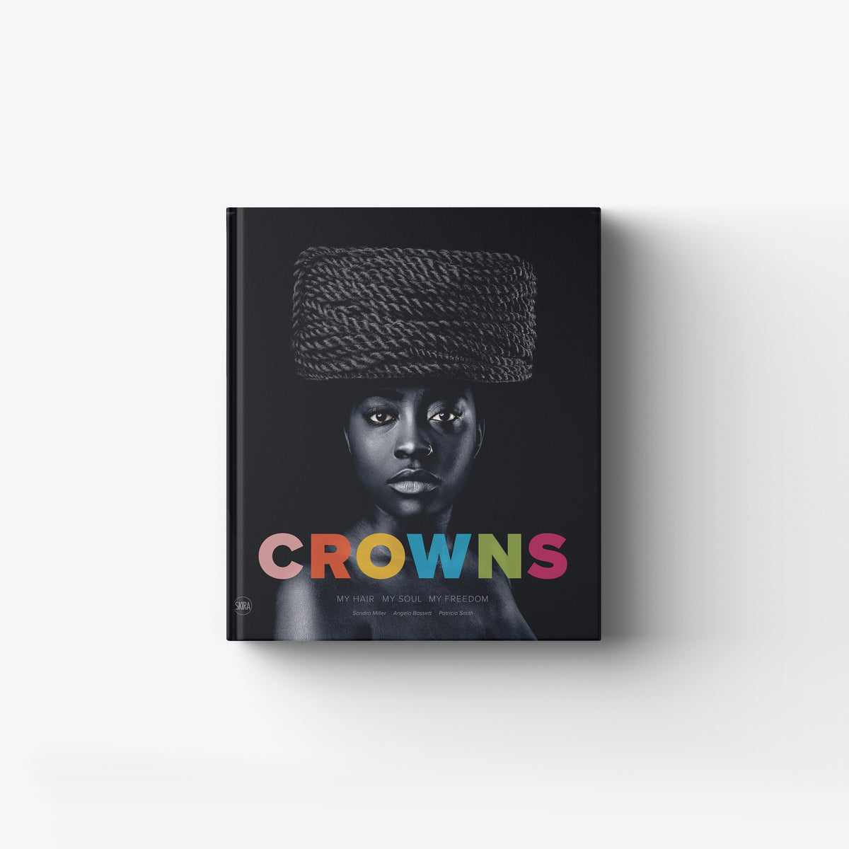 Art book by Skira Arte in dark tones, featuring a photographic portrait with a themed hair and identity project