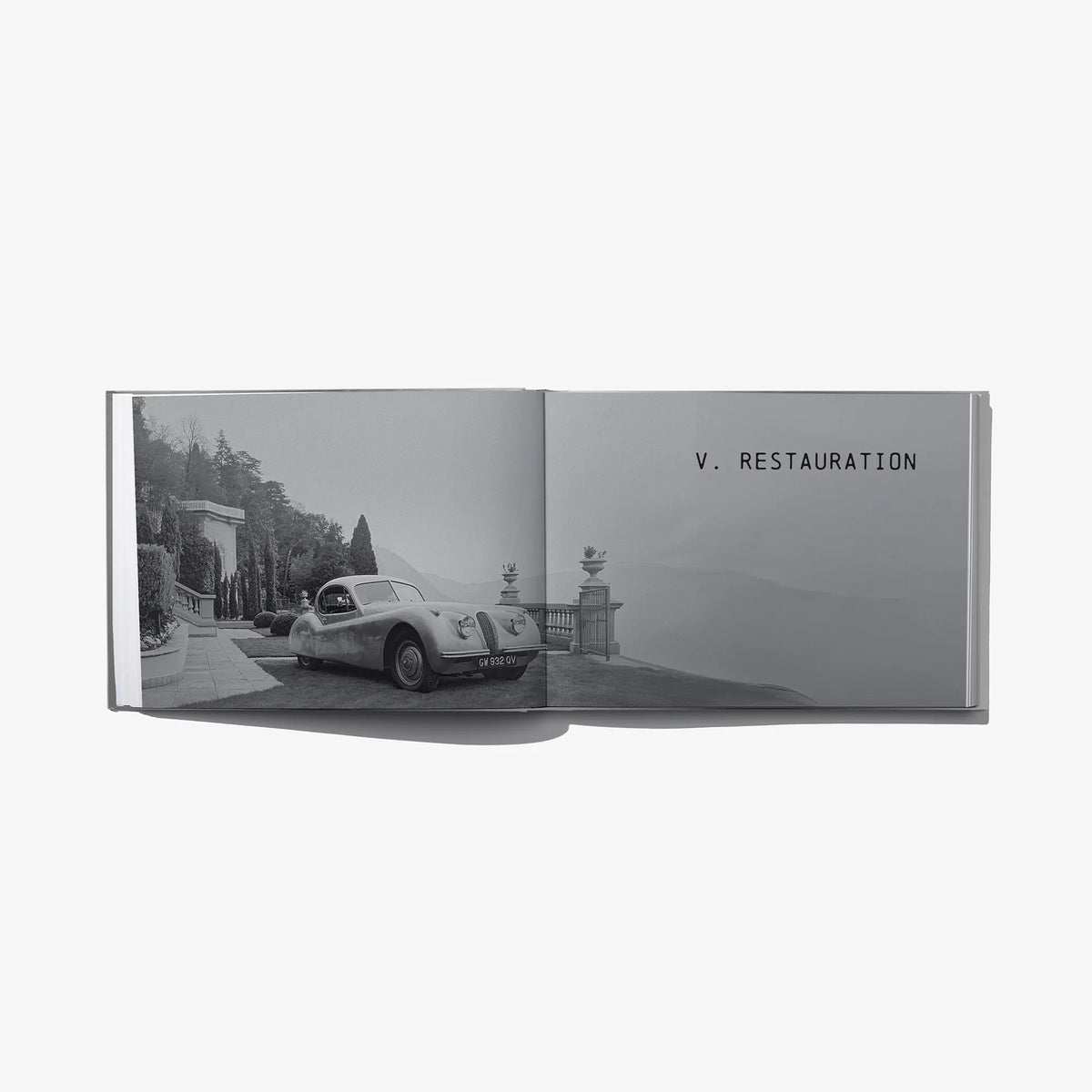 Dandy Crush book spread with white classic car in a garden driveway