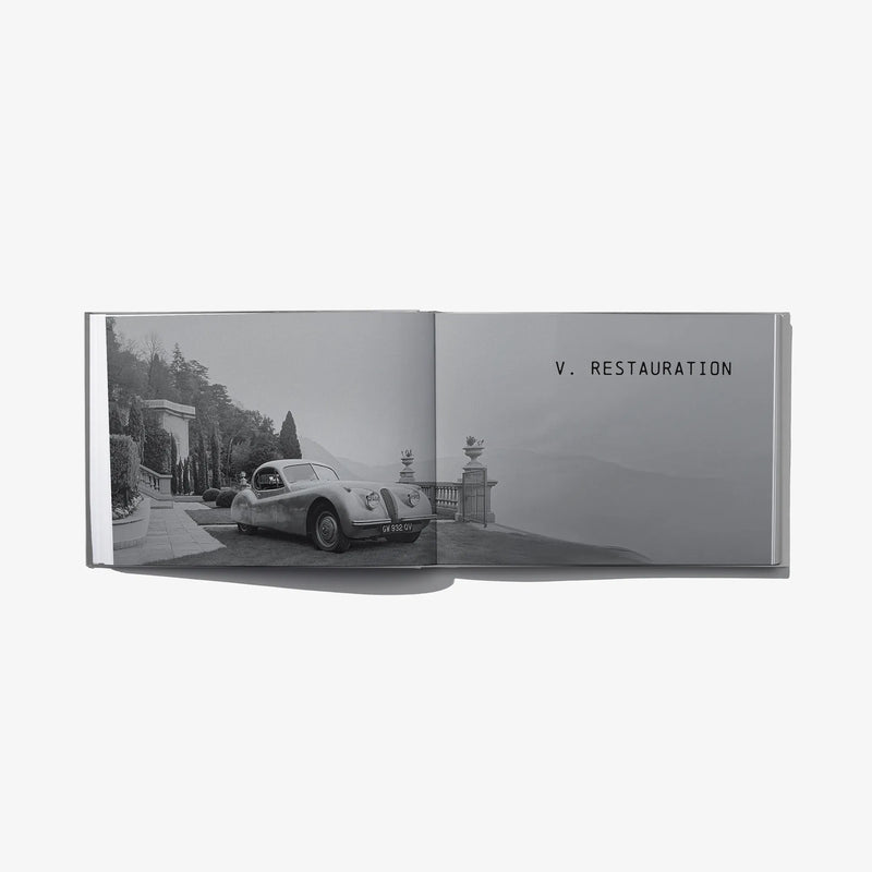 Dandy Crush book spread with white classic car in a garden driveway