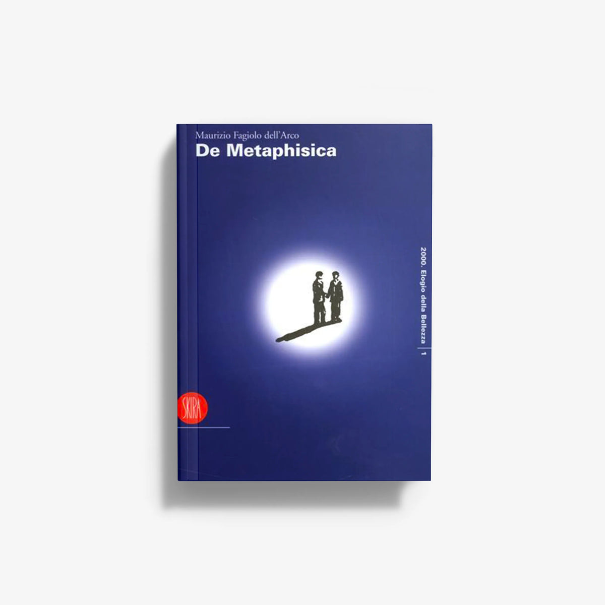 Contemporary art book in deep blue with Skira Arte branding, De Metaphisica, on paper