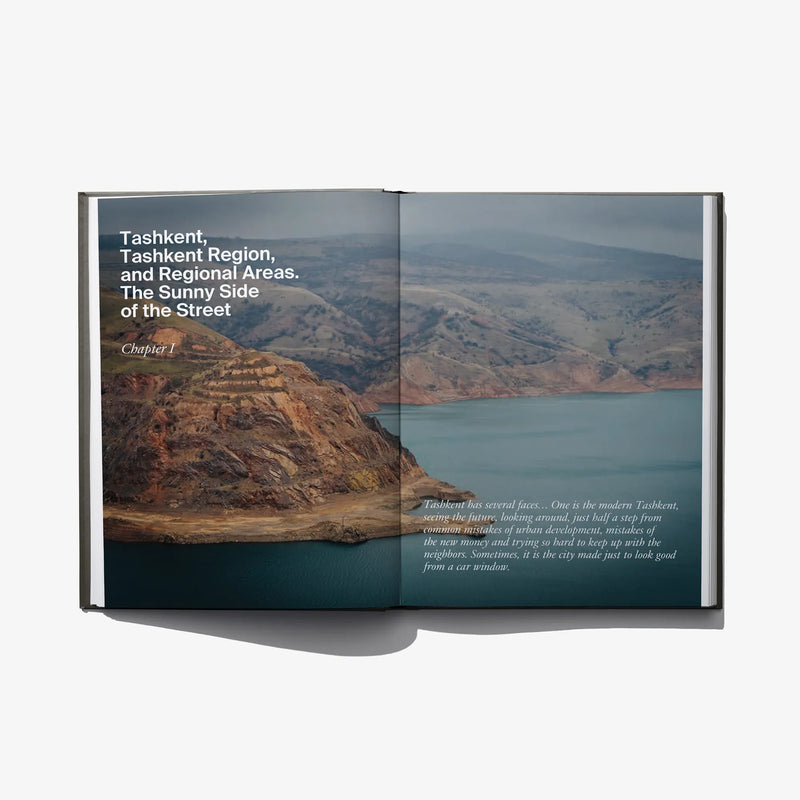 Open book spread with chapter title about Tashkent and mountain lake landscape photo