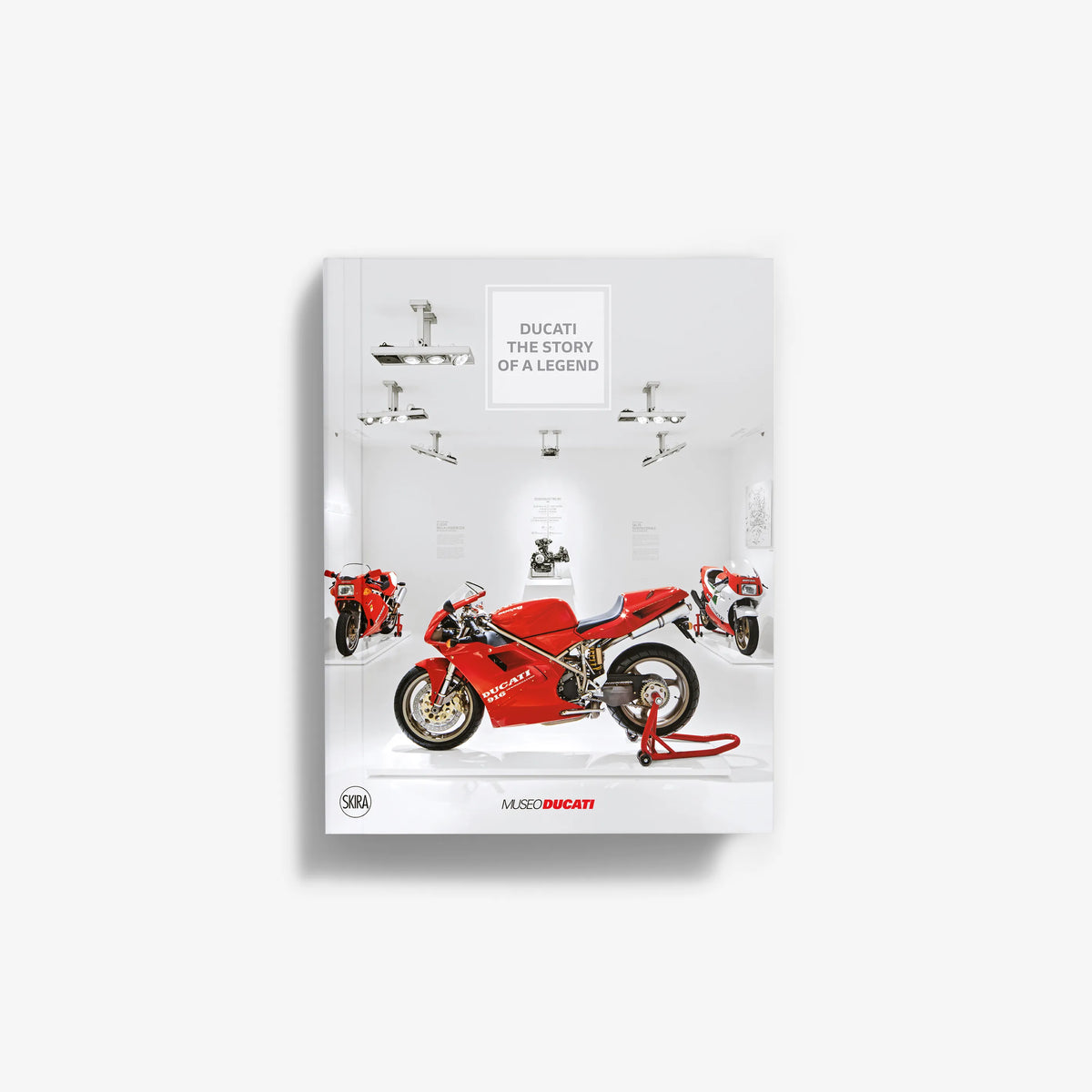 Ducati photo book with red motorcycles on a white cover