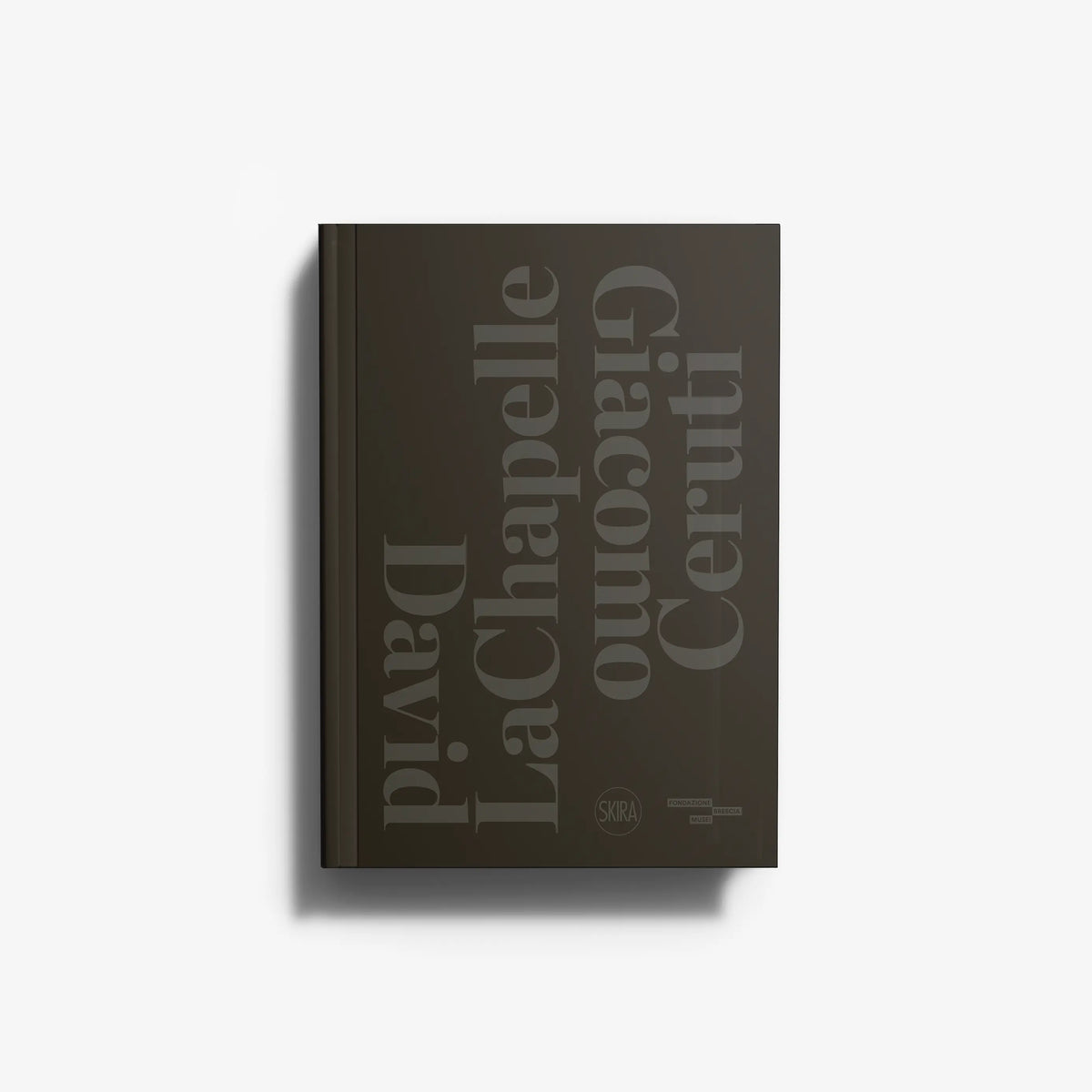 Contemporary photography book in dark brown with large typographic text, Skira Arte, tendopoli di senzatetto davanti al LACMA