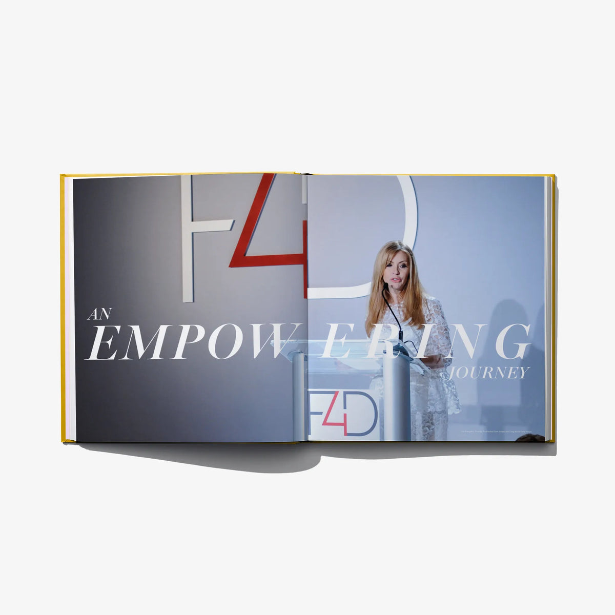 Open Fashion 4 Development book showing an empowering journey title spread and a portrait.