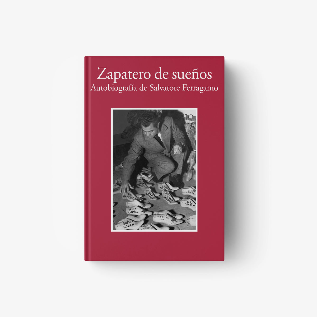 Red hardcover autobiography book with title text and black-and-white portrait photo