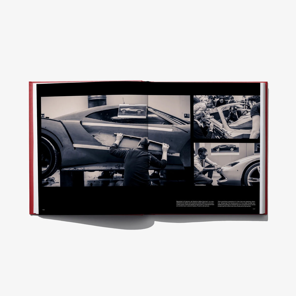 Open design book with black-and-white car workshop photos and hands-on assembly scenes
