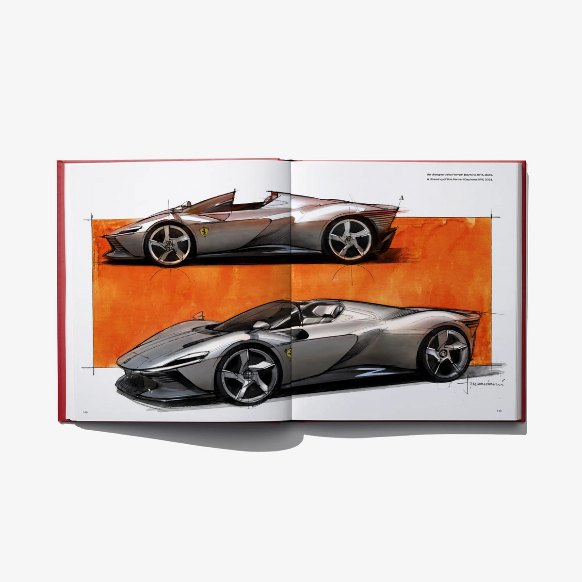 Open design book featuring two car render sketches with orange and gray backgrounds
