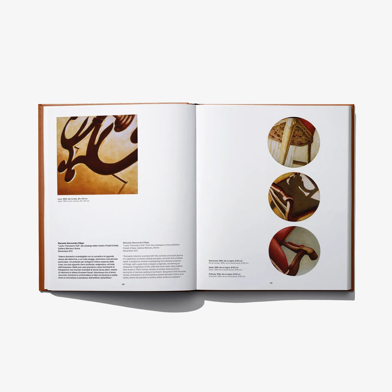 Open art book spread with four color abstract photo insets on both pages