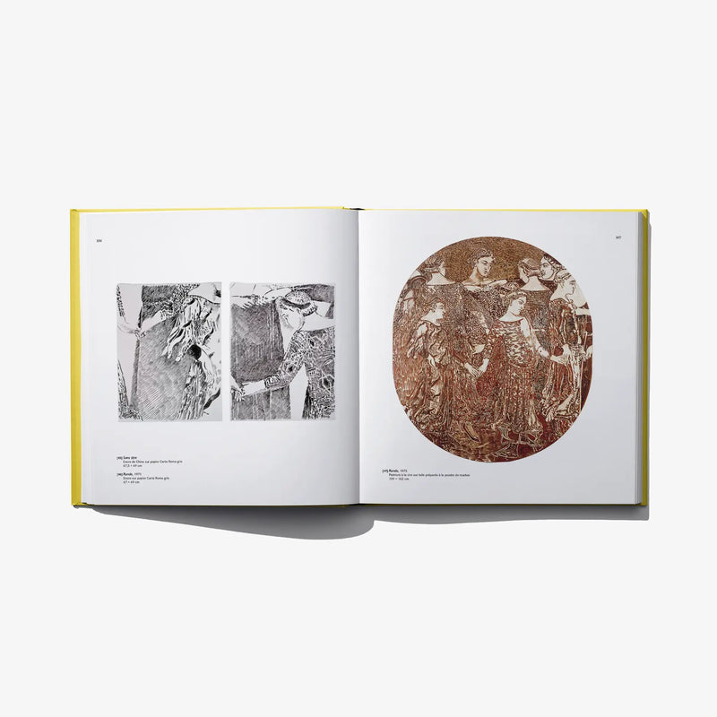 Open art book with black-and-white figures and a brown circular artwork