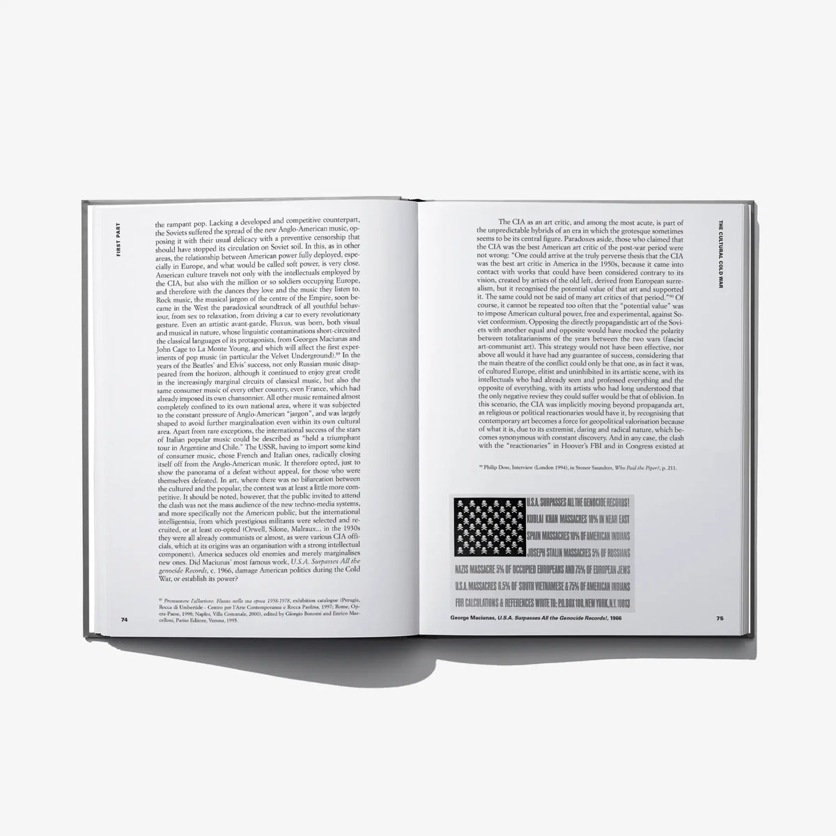 Open hardcover book spread with dense paragraphs and small grayscale photo block