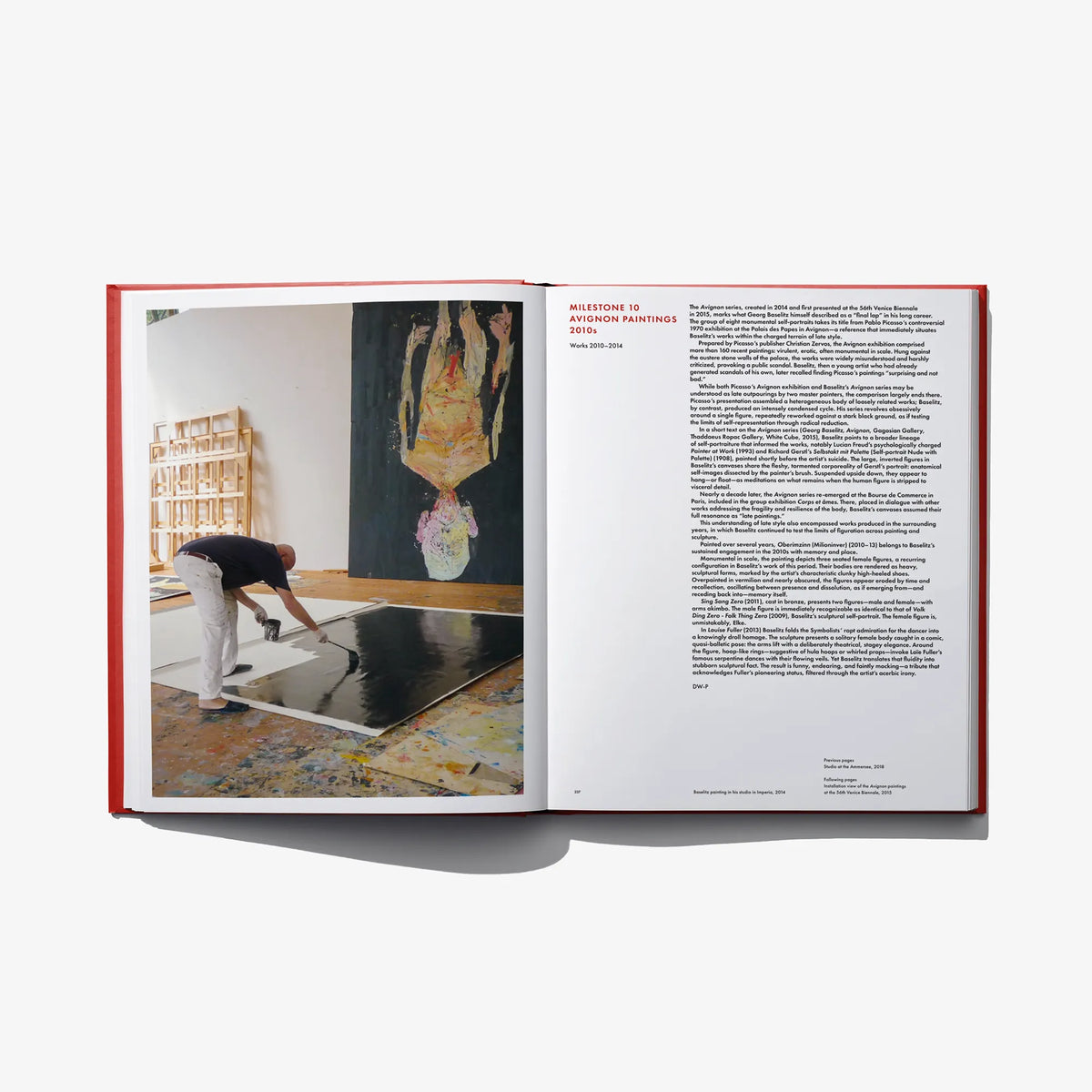 Open art book with studio photo on left and dense text on right page