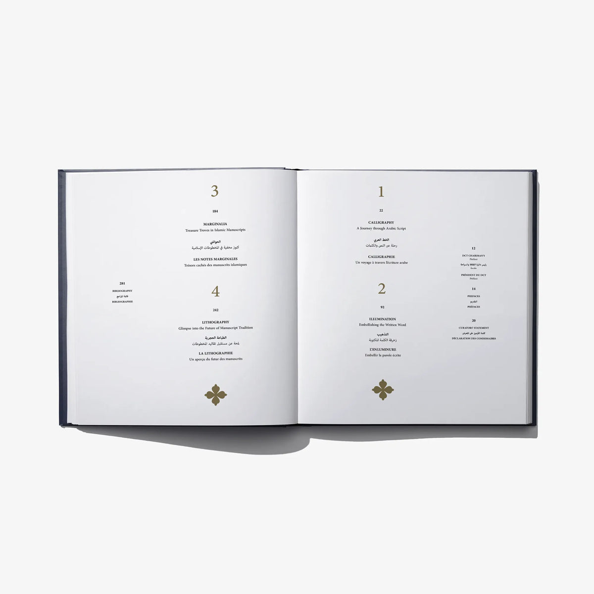 Open book spread with numbered sections on white pages and decorative emblem icons.