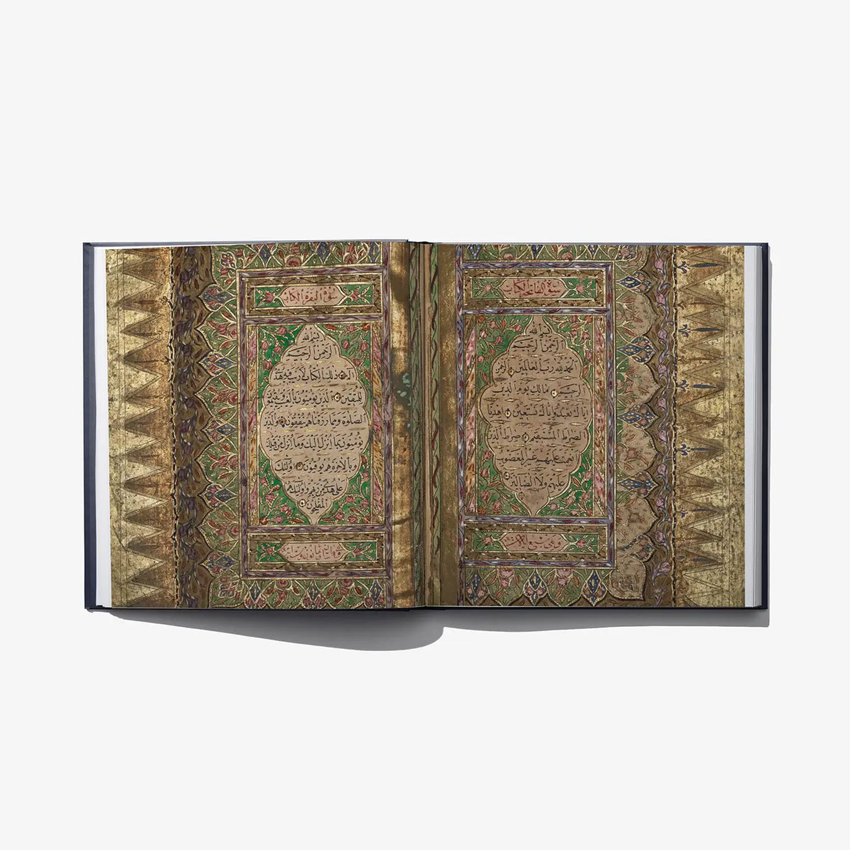Open book spread with gold patterned pages and colorful geometric illuminated medallions.