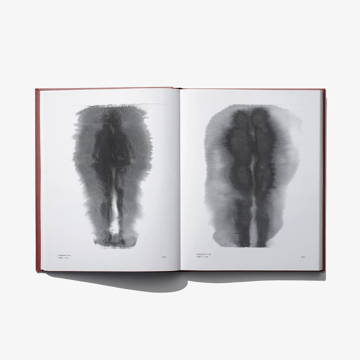 Open book spread with two abstract black-and-white figure forms shown side by side.