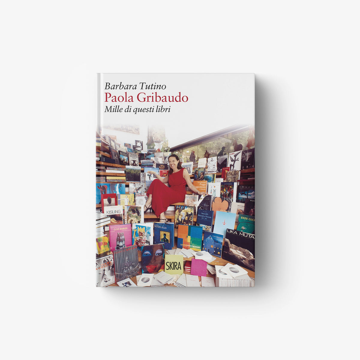 Book with Paola Gribaudo title on illustrated collage cover of books and people