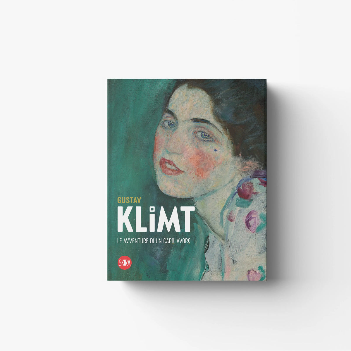Art book Gustav Klimt by Skira Arte, teal cover with close-up portrait and text Gustav Klimt Le avventure di un capolavoro