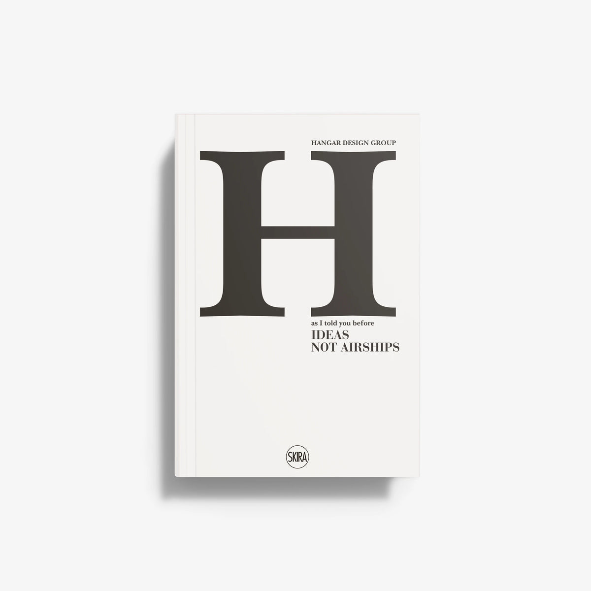 Hardcover book with white cover, large black letter H, and SKIRA logo at bottom